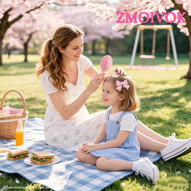 ZMOIVOK brush in hand conveying compact size and easy portability benefit