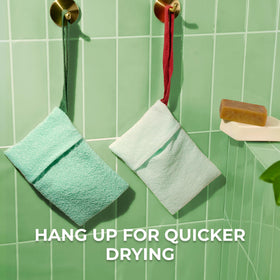 ZOMCHI mint soap bag hanging in shower showing quick-dry loop and tidy storage benefit