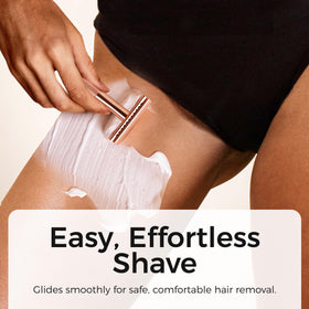ZOMCHI razor held in hand to show size, balance, and ergonomic benefit